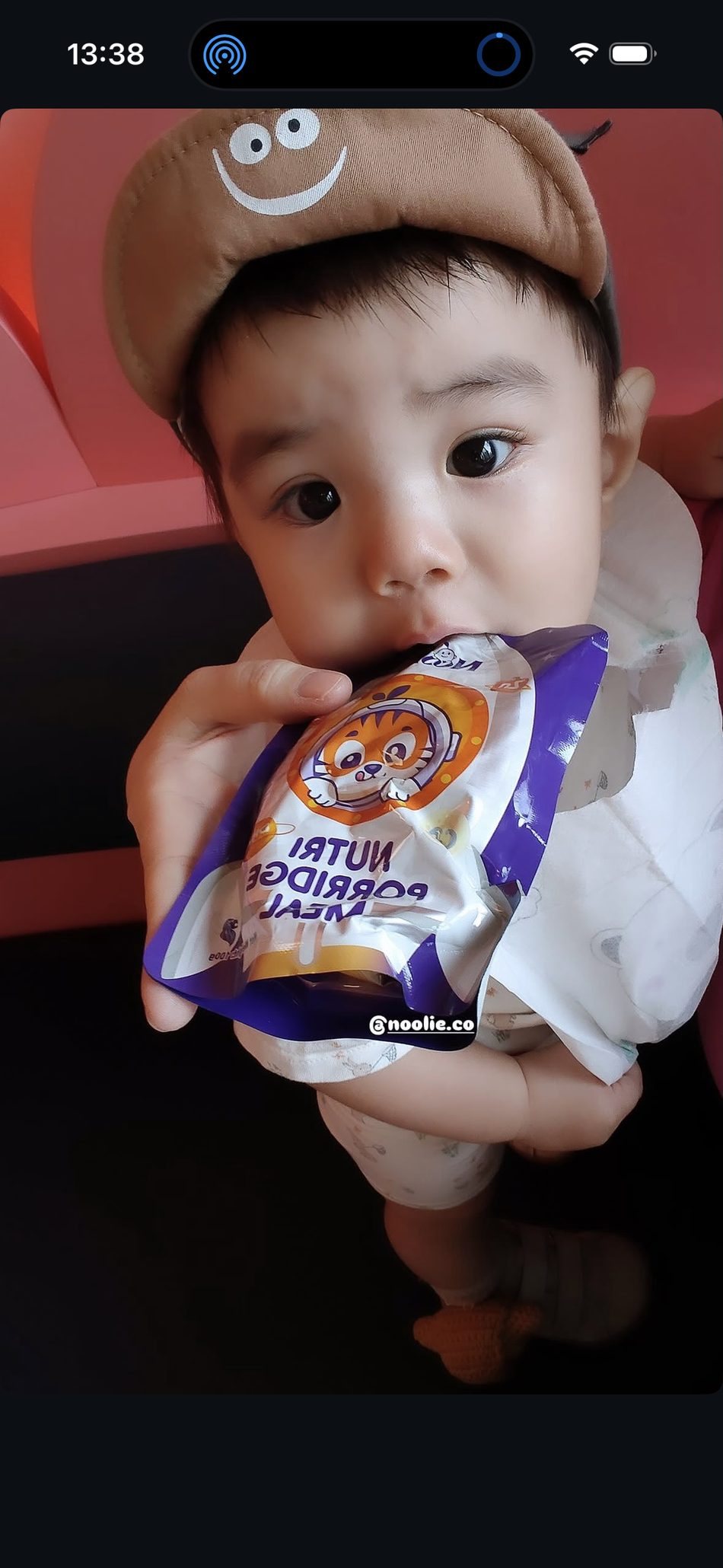 Child trying Noolie